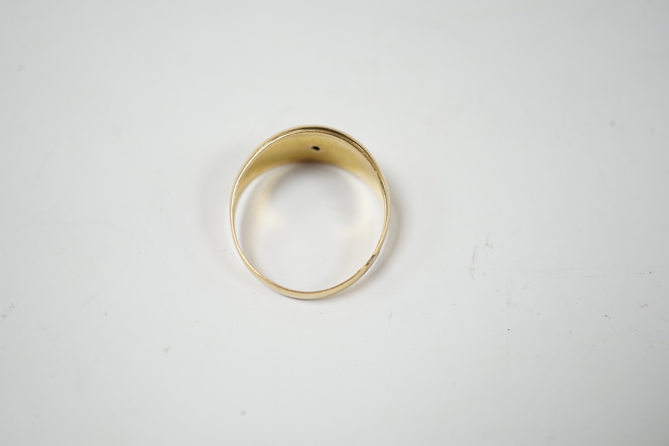 A George V 18ct gold and three stone gypsy set diamond chip set ring, size R, gross weight 3.3 grams.